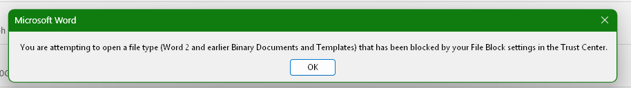 Microsoft Word warning that Word 2 and earlier binary documents are blocked by File Block settings.