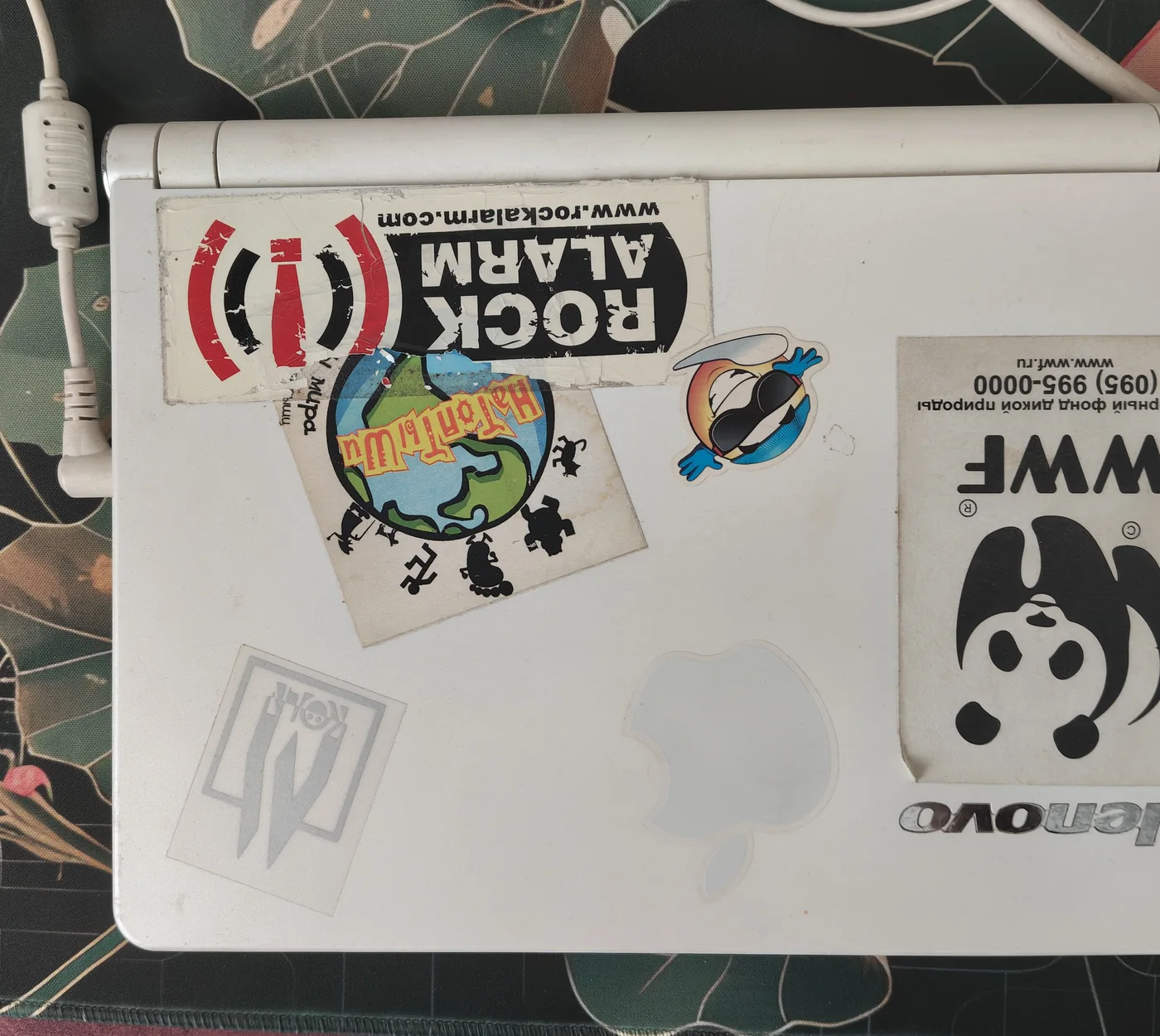 Sticker-covered lid of the recovered Lenovo S9