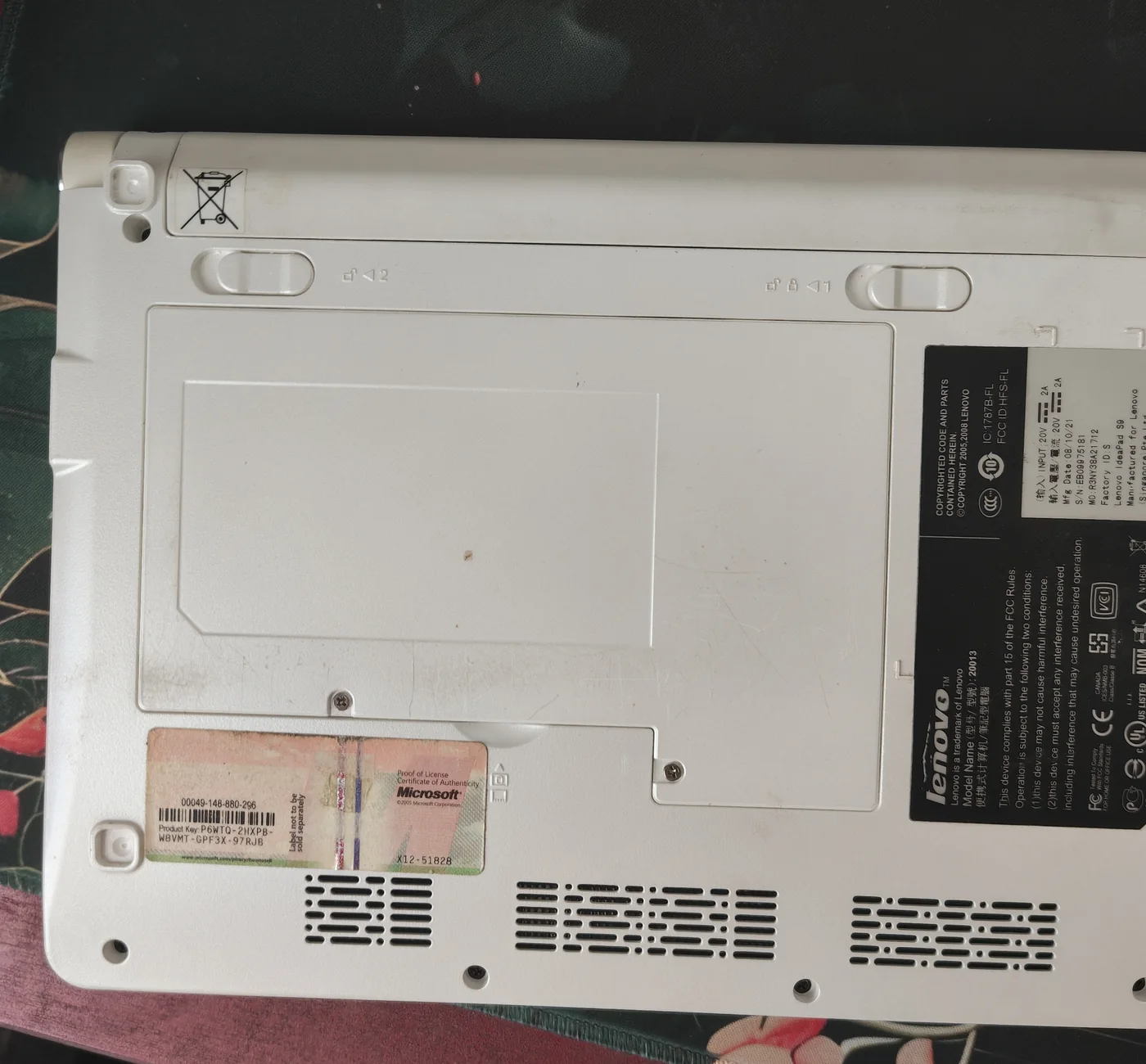 Underside and original label of the recovered Lenovo S9